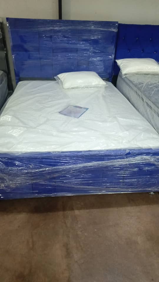 cama matrimunial de 140*190 forrada entela con cpete